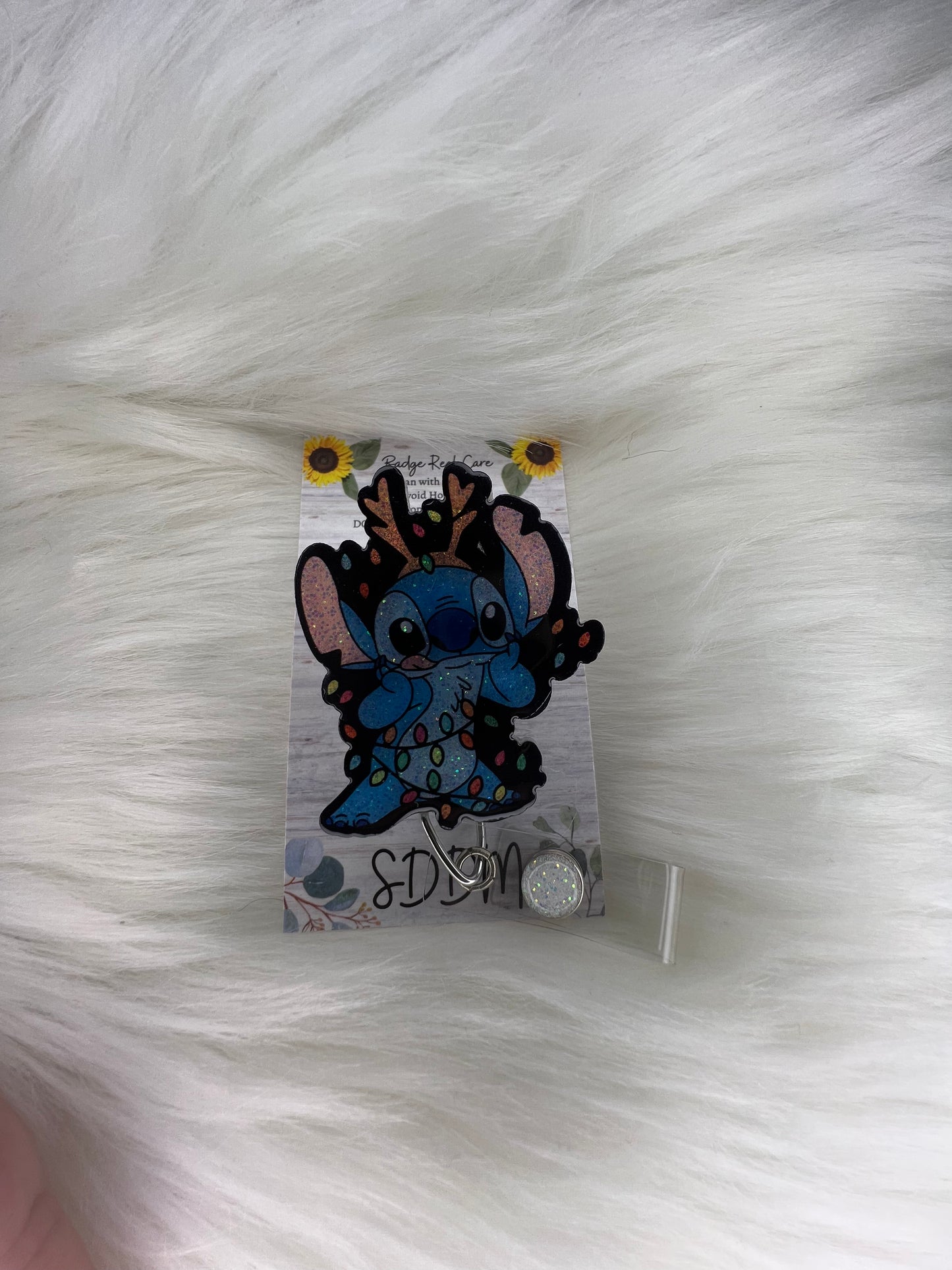 Lilo and Stitch Christmas badge reel